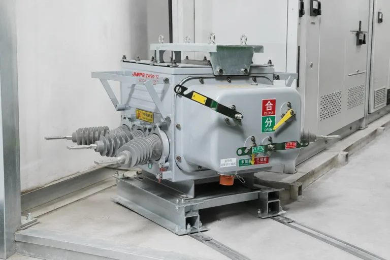 Vacuum circuit breaker mounted beside a medium-voltage switchgear lineup